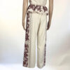 Conjunto estampado bohemio con chaleco sin mangas y pantalón largo fluido. Diseño ligero y versátil, ideal para cualquier ocasión.